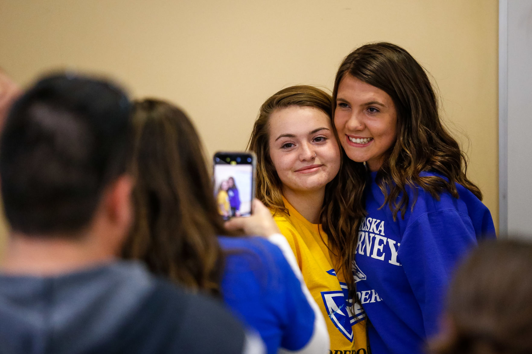 SIGNING DAY: Rampart athletes sign their National Letter of Intent